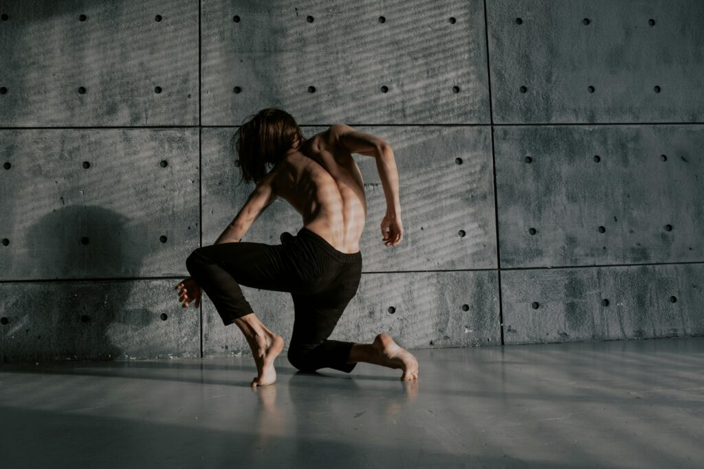 Shirtless Man Dancing Alone